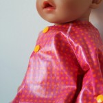 Puppe mit Regenmantel - doll with raincoat